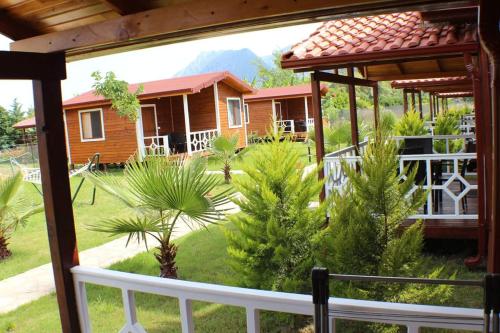a view of a house from a porch at Villa Efsane Hotel in Cıralı