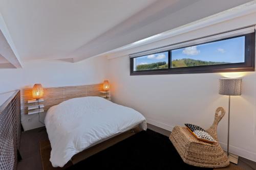 Residence Le Valliopeにあるベッド
