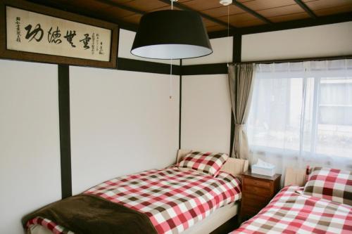 Krevet ili kreveti u jedinici u okviru objekta Sapporo - House / Vacation STAY 4991