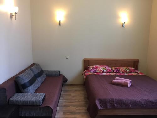 Postelja oz. postelje v sobi nastanitve Cat Garden Premium Apartments Riga