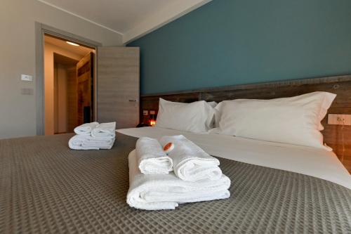 Posteľ alebo postele v izbe v ubytovaní Du Parc Hotel