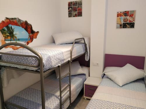 Apartamento primera linea de playa con gran patio, consultar disponibilidad de aparcamiento