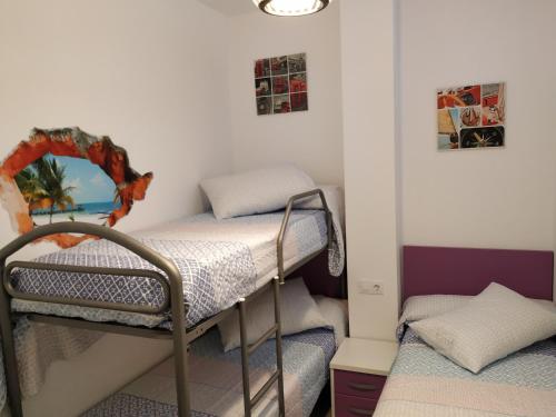 Apartamento primera linea de playa con gran patio, consultar disponibilidad de aparcamiento