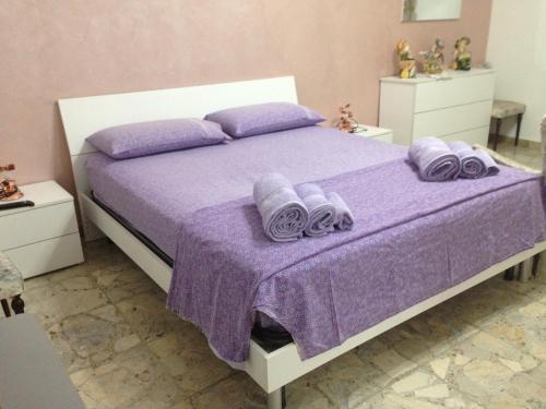 Кровать или кровати в номере Bedrooms Rachele