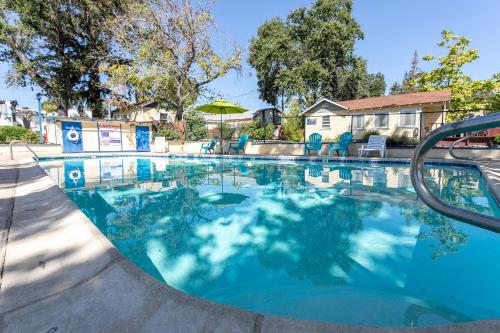 a large swimming pool with blue water at Skylark Shores Resort in Lakeport