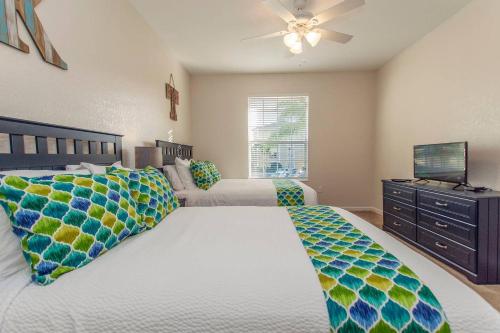 Voodi või voodid majutusasutuse Vista Cay Standard 3 bedroom condo (#3111) toas