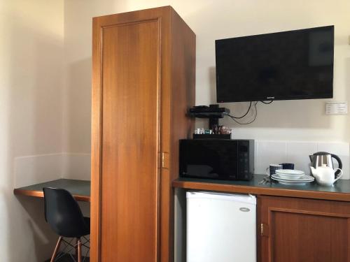 Cucina o angolo cottura di Airport Clayfield Motel