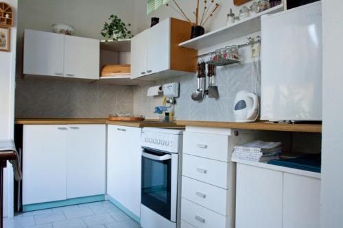 Kuchyň nebo kuchyňský kout v ubytování Privat No. 40