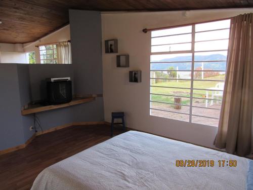 Кровать или кровати в номере Casa rural tipo loft