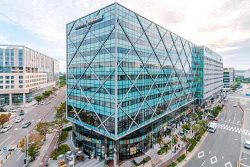 an overhead view of a glass office building at Howard Johnson by Wyndham Incheon Airport in Incheon