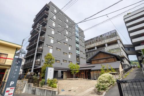 a building in the middle of a city at DogoYaya in Matsuyama