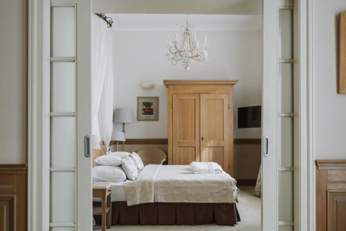 Postel nebo postele na pokoji v ubytování Art Hotel