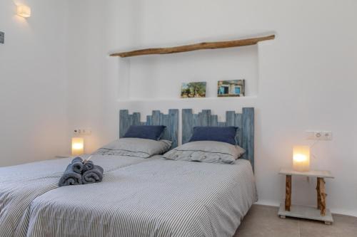 Postel nebo postele na pokoji v ubytování Mikri Villas