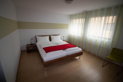 Ein Bett oder Betten in einem Zimmer der Unterkunft Motel Mühle