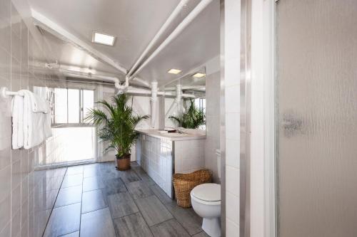 Koupelna v ubytování Hotel Abri du Voyageur