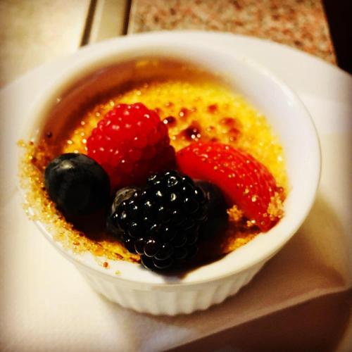 a bowl of food with fruit on a table at Apartmány Braníčkov in Branickov