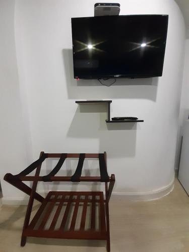 TV a/nebo společenská místnost v ubytování Palmare House