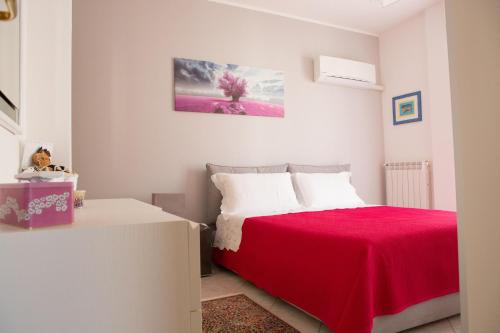 A bed or beds in a room at Viona Apartments