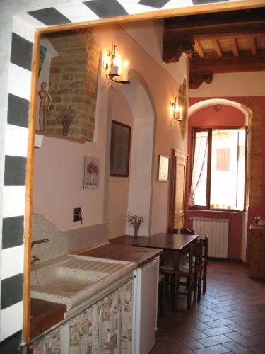 Ett kök eller pentry på Locazione Turistica Totti