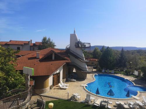 a view of a resort with a swimming pool at Ecostar 10.1.B in Rogachevo