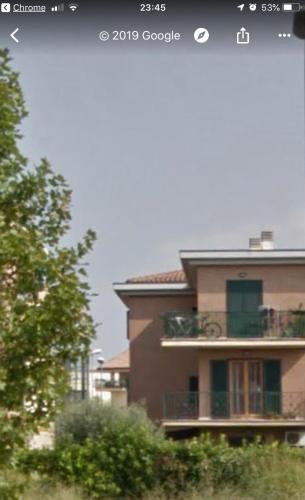 a picture of a building with a balcony at SweetHome Fabio&Stefy in Guidonia
