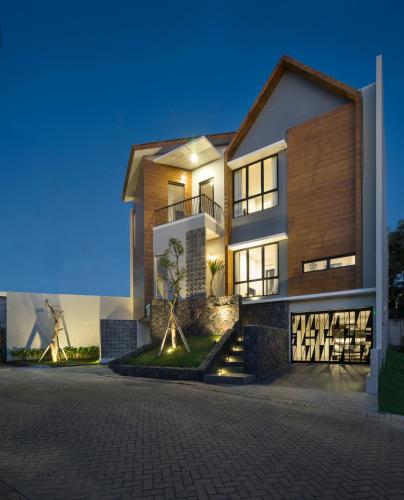 a rendering of a house at night at GAIA Lodge The Kusuma Hill Batu - Malang in Batu