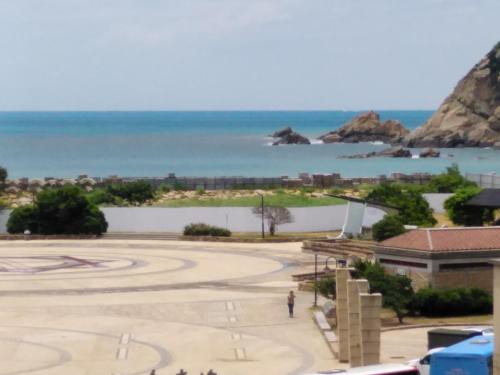 a view of the ocean from a building at 星海芝家民宿Samuel's Home in Nangan