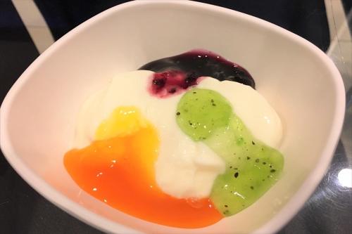 a white bowl filled with different types of food at Green Rich Hotel Hamada Ekimae (Artificial hot spring Futamata Yunohana) in Hamada