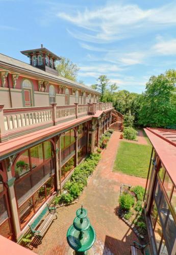 an overhead view of a building with a garden at Southern Mansion in Cape May