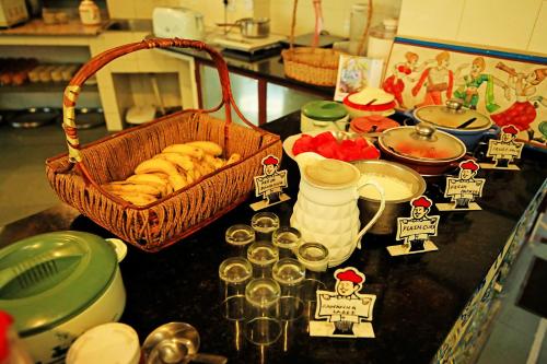 a counter with a basket of food on a table at V One Pride in Jaipur