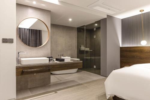 Kylpyhuone majoituspaikassa H hotel Gasan