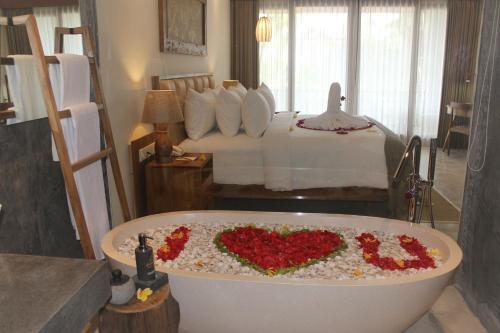 Zona de estar de Purana Suite Ubud
