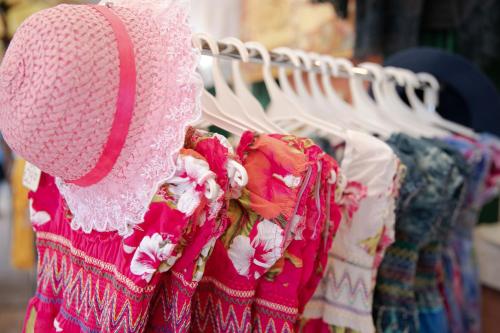 a bunch of dresses hanging on a rack at Junior Suites Venezia in Venice
