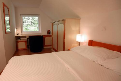 Un pat sau paturi într-o cameră la Apartment Pri Leju