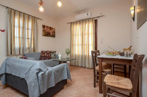 Ένα ή περισσότερα κρεβάτια σε δωμάτιο στο Theonis Villas