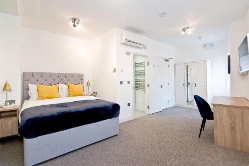 Interlude House C by City Living London tesisinde bir odada yatak veya yataklar