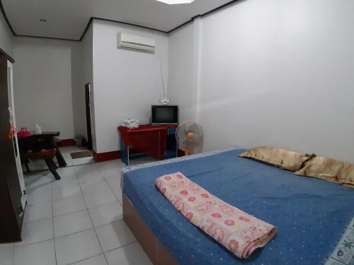 Voodi või voodid majutusasutuse I love you 777 ไอเลิฟยู หัวสนามบิน Pet Friendly Airport Resort toas