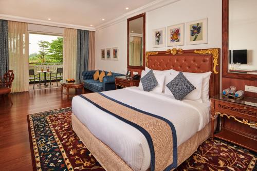 Un ou plusieurs lits dans un hébergement de l'établissement MAYFAIR Lake Resort