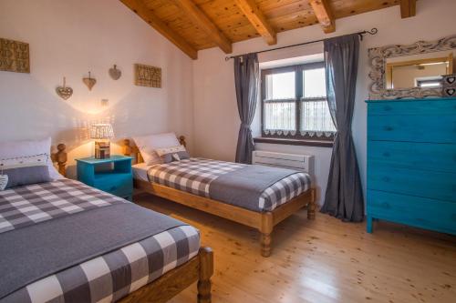 Postel nebo postele na pokoji v ubytování Holiday Home Blue Ivy