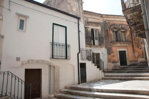 a group of stairs leading to a building at Filinona in Modica