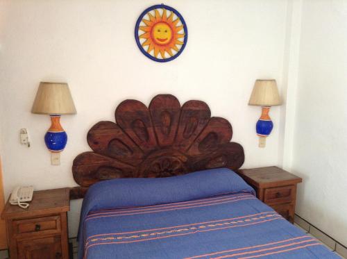 Кровать или кровати в номере Hotel & Suites Coral