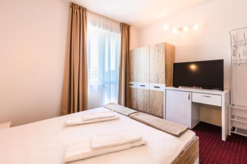 Postel nebo postele na pokoji v ubytování Guest House Theona