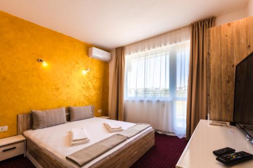Postel nebo postele na pokoji v ubytování Guest House Theona