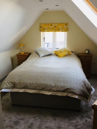 a bedroom with a large bed with a window at 75 High Street in Melbourne
