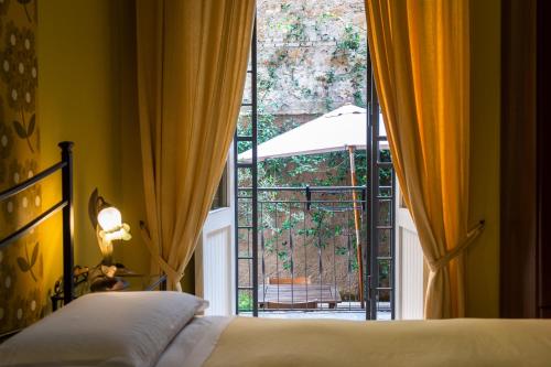 A bed or beds in a room at Vaticana Ottaviani