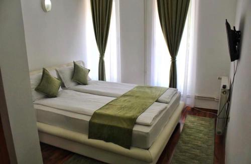Postel nebo postele na pokoji v ubytování Hotel Fontana