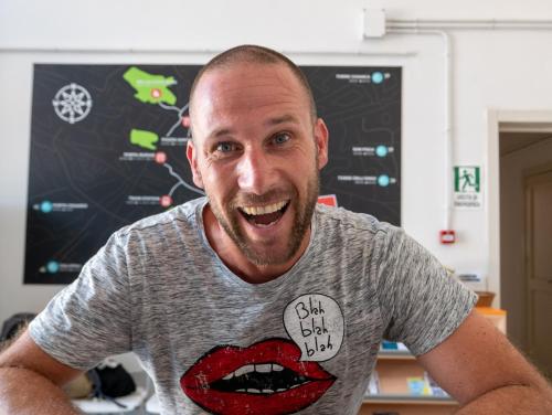 a man wearing a shirt with his mouth on it at Lobby Collective Hostel - Lecce in Lecce