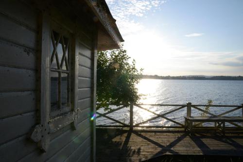 a window of a building with a view of the water at Risberg Herrgård in Hagfors