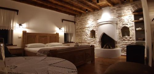 Ένα ή περισσότερα κρεβάτια σε δωμάτιο στο Braja House