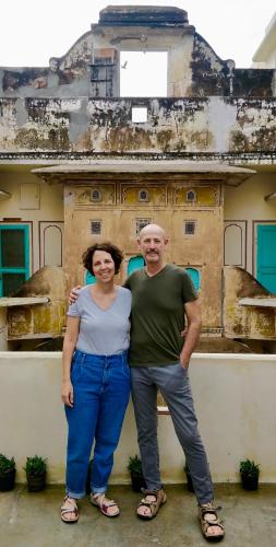 a man and a woman standing in front of a building at Jaipur Haveli in Jaipur